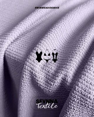 Embossed Print Recycled Lycra Fabric Stretch Material Designed for Eco Conscious Activewear Swimwear and Sports Apparel Creation